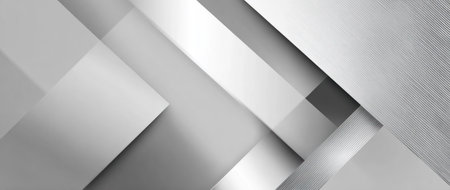 This image features an abstract composition consisting of various geometric shapes, primarily rectangles and squares, layered to create depth. The color palette is limited to shades of gray, with subtle variations suggesting light and shadow. The design could be used in various commercial applications, such as website backgrounds or print media.の素材