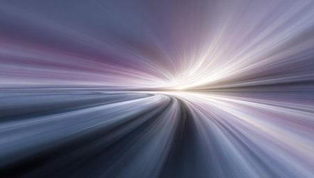 This abstract image presents a dynamic composition of light streaks, creating a sense of rapid movement. Predominantly cool tones of blue and purple blend with bright white light, achieving a blurred effect. It suggests a journey or passage, suitable for use in digital art, design backgrounds, or visual presentations.の素材