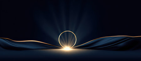 An artistic composition features a golden circle radiating light, set against a dark blue satin backdrop. The flowing fabric adds depth and texture, enhanced by soft lighting. Suitable for advertising and promotional use, the image is versatile for various design projects and commercial applications with copy space.の素材