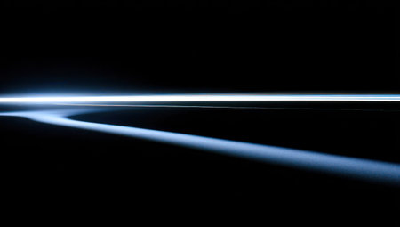 An abstract digital artwork features a bright, luminous streak of light against a stark black backdrop. The composition highlights contrasting tones and dynamic lines, with soft gradients. The image evokes a sense of movement and energy, suitable for various design projects and commercial applications.の素材
