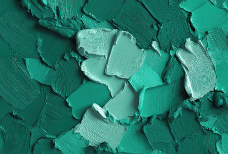 Close-up of textured, abstract teal and off-white oil paint strokesの素材