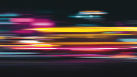 Abstract blurry colorful horizontal streaks suggest city lights at nightの素材
