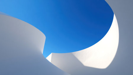 Curved white forms frame a vibrant blue sky in an abstract, minimalist compositionの素材