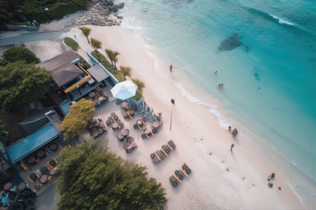 birds-eye view of beachside eatery, with crystal clear water and golden sand in the background, created with generative aiの素材