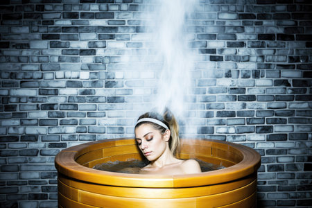 shot of a young woman relaxing with her eyes closed in a sauna at the spa, created with generative aiの素材