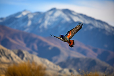 colorful bird in flight against scenic mountain backdrop, created with generative aiの素材