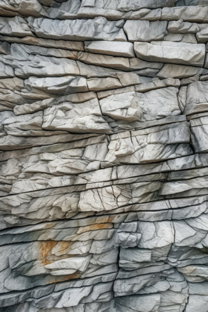 close-up of textured stone wall with natural pattern, created with generative aiの素材