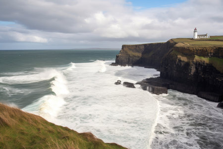 seaside cliff with lighthouse and waves breaking on the shore in the distance, created with generative aiの素材