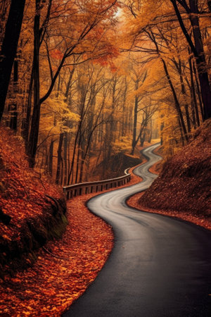 a winding road lined with trees in autumn colors, created with generative aiの素材