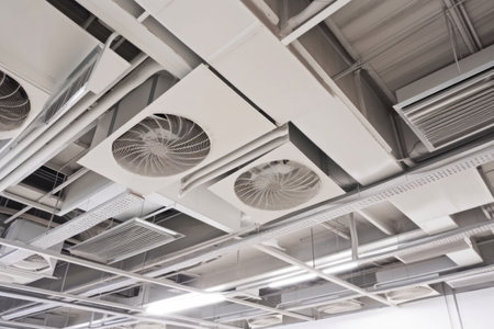 ventilation system with vents and fans in ceiling of warehouse or factory, providing fresh air and removing odors, created with generative aiの素材