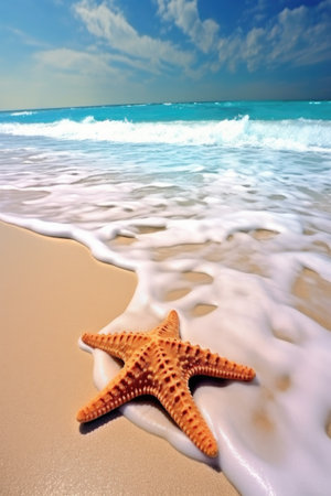 starfish resting on a sandy beach with ocean waves, created with generative aiの素材