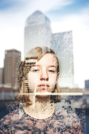 multiple exposure portrait of a teenage girl against a city background, created with generative aiの素材