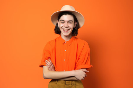 genderqueer person, fashion and freedom of clothing with a smile against an orange background, created with generative aiの素材