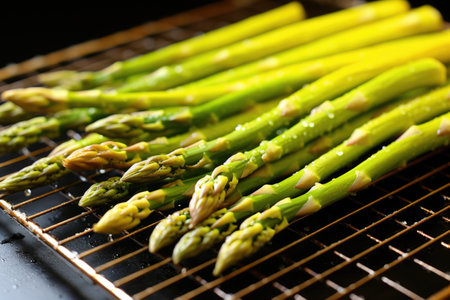 fresh asparagus spears with golden tips on a cooling rack, created with generative aiの素材