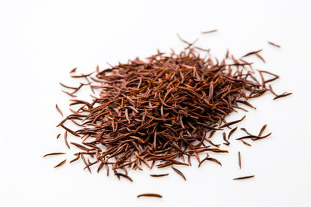 jinjunmei black tea leaves on a white surface, created with generative aiの素材