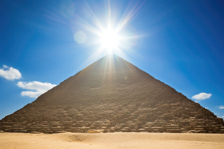 sun-topped pyramid at high noon, created with generative aiの素材