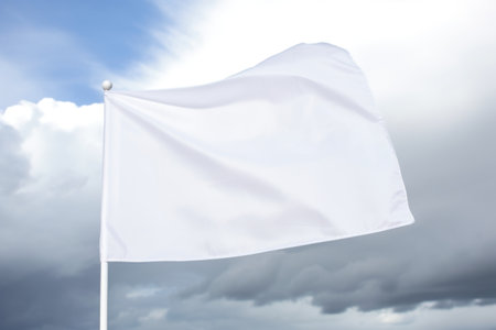 white flag waving against a cloudy sky, created with generative aiの素材