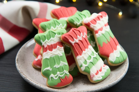 christmas socks-shaped cookies with red, white and green frosting, created with generative aiの素材