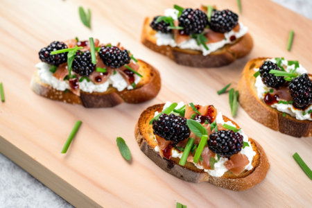 high-angle shot of blackberries atop lightly toasted bruschetta, created with generative aiの素材