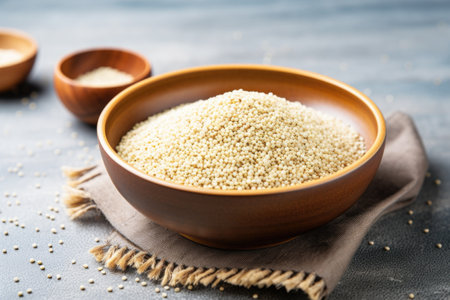 a bowl of quinoa sprinkled with sesame seeds, created with generative aiの素材