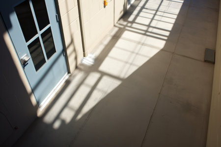 prison cell with a shadow of an airplane, created with generative aiの素材