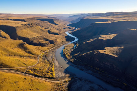 drone photograph of a river flowing through a valley, created with generative aiの素材