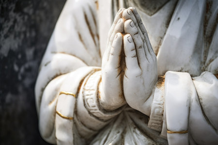 close-up of a marble saint sculpture hands in prayer, created with generative aiの素材
