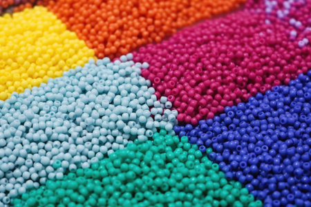 close-up of silicone rubber beads in different sizes, created with generative aiの素材