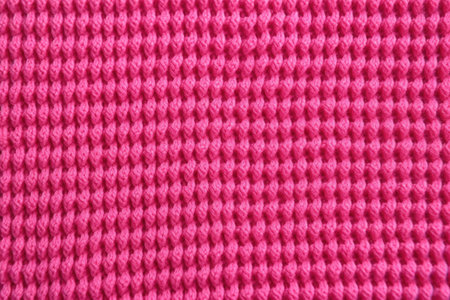 macro view of a pink knit sweater material, created with generative aiの素材