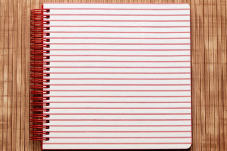 spiral notebook paper with ruled lines, created with generative aiの素材