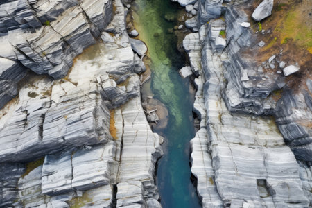 overhead shot of a rocky riverbed, created with generative aiの素材