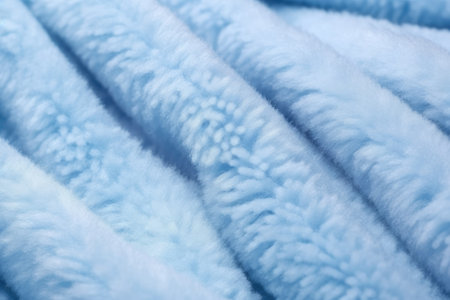 macro shot of fluffy soft cashmere fabric in pastel blue, created with generative aiの素材