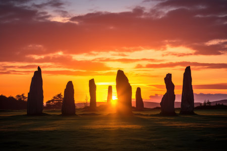 silhouette of a stone circle against a vivid sunset sky, created with generative aiの素材