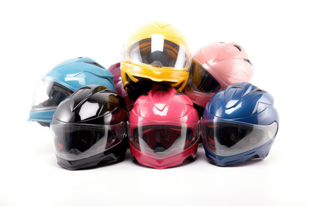 collection of colorful motorcycle helmets on a white background, created with generative aiの素材