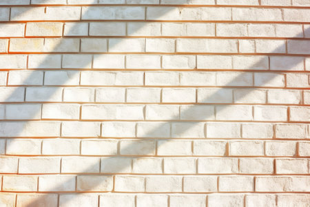sun-bleached white brick wall in bright sunlight, created with generative aiの素材