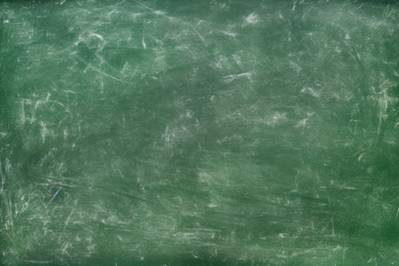 detail of erased chalk traces on a green chalkboard, created with generative aiの素材
