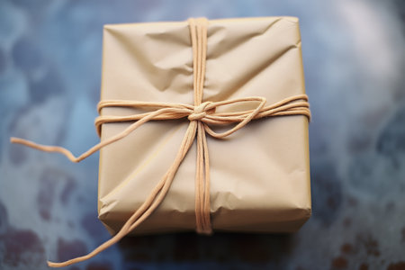 close-up of twine tied around a brown paper packageの素材