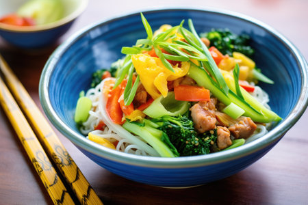 colorful bowl of sausage and fresh vegetable stir-fryの素材