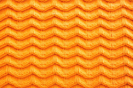 knitted sweater close-up, showing intricate stitch patternの素材