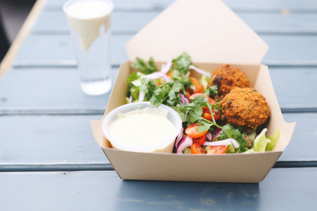 falafel in a compact box with tahini for takeawayの素材