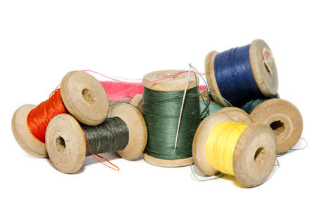 colored thread on a white backgroundの写真素材
