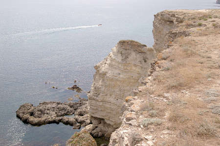 rocky coast against the seaの写真素材