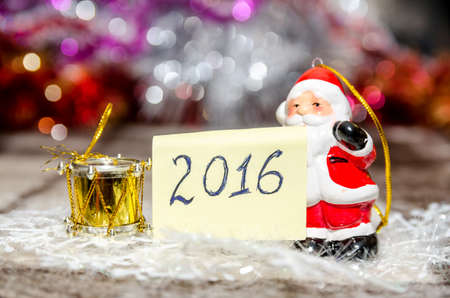 Christmas decoration. 2016 text with toy Santa Clausの写真素材