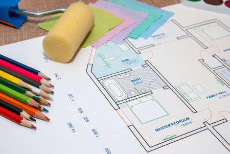 architectural plan of the house with color palette, pencil and fabric samplesの写真素材