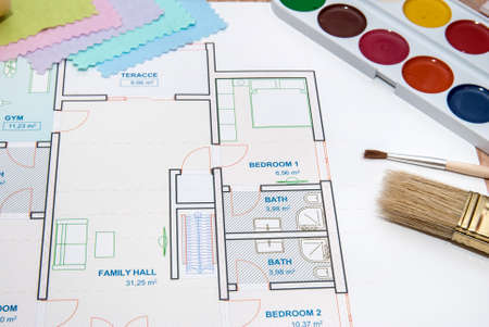 architectural plan of the house with color palette, pencil and fabric samplesの写真素材