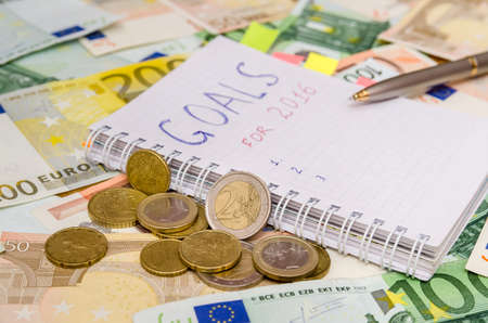 New years resolutions save money. euro backgroundの写真素材