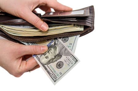 wallet with dollars in the woman hands isolatedの写真素材