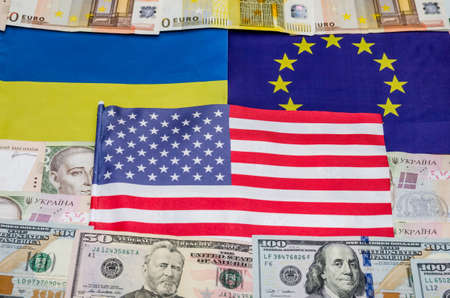 flags of America of Europe and Ukraine with moneyの写真素材