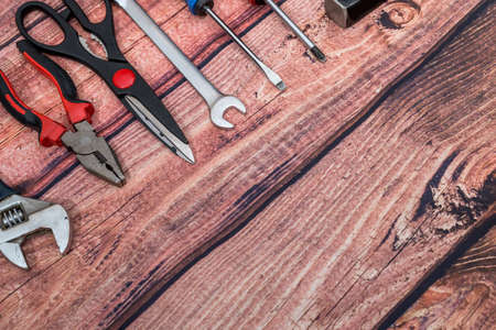 different work tools on wooden desk.の写真素材