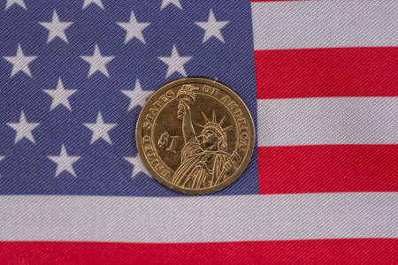 close up of american flag and cent coins, nationalism concept.の写真素材